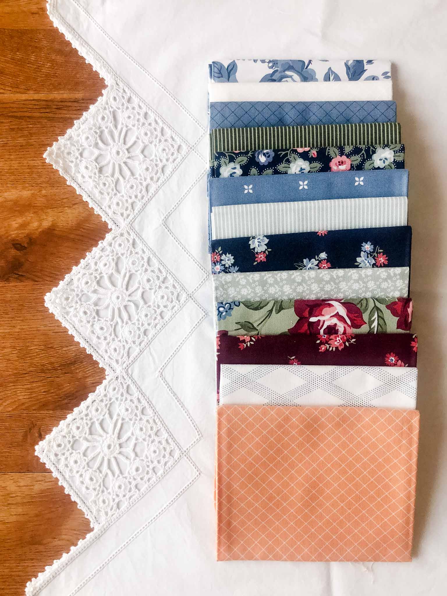 13 fat quarters; orange, blue, green, white 